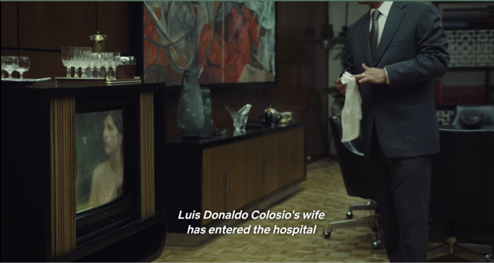 President Salinas (Ari Brickman) watches the news report the death of presidential candidate Colosio and cleans his hands. Did he have something to do with his murder? (Screenshot from Crime Diaries: The Candidate)